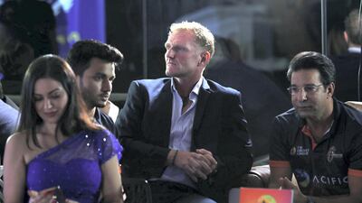 Dougie Brown, centre, will be the Maratha Arabians coach while Wasim Akram, right, will be mentor of the side. Chris Whiteoak / The National