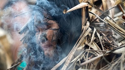 A devotee prays at the church