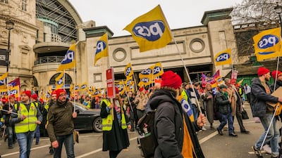 Striking civil servants march through Westminster in London. Bloomberg