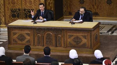 Syrian president Bashar Al Assad speaks during a meeting with the youth religious team, in Damascus on February 15, 2017 as minister of Awqaf Mohammad Abdul-Sattar Al Sayyed looks on. Sana/ EPA