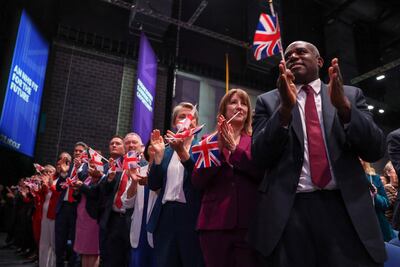 Britain's Deputy Prime Minister David Lammy and other members of the cabinet give Keir Starmer a standing ovation. Reuters