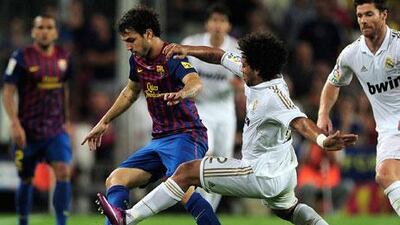 Acquisitions, such as Cesc Fabregas, left, just keep making Barcelona better. Marcelo, tackling Fabregas here, and Real Madrid can give chase, but few other teams in La Liga can.