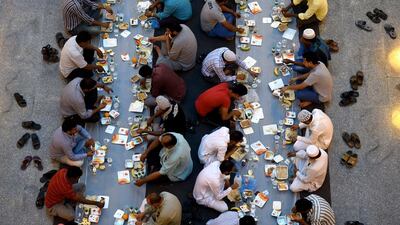 Saudi and foreign Muslims break their fast during the holy month of Ramadan at Turki bin Abdulaziz grand mosque in Riyadh, Saudi Arabia. Fayez Nureldine / AFP
