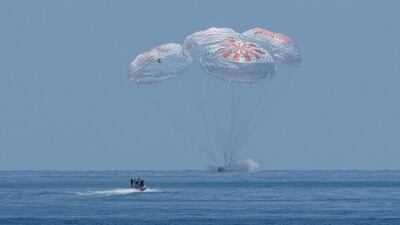 SpaceX Crew Dragon Endeavour spacecraft is seen as it lands with NASA astronauts Robert Behnken and Douglas Hurley onboard in the Gulf of Mexico off the coast of Pensacola, Florida. AFP