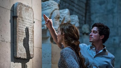 Perdita Weeks and Ben Feldman in a scene from As Above, So Below. Bruno Calvo / Universal Pictures