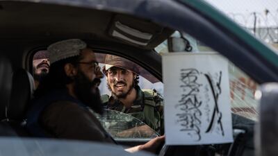 Taliban guards patrol Kabul's roads. Stefanie Glinski / The National