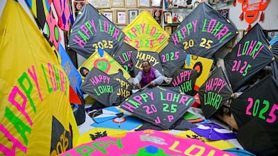A man prepares kites ahead of Lohri harvest festival in Amritsar. AFP