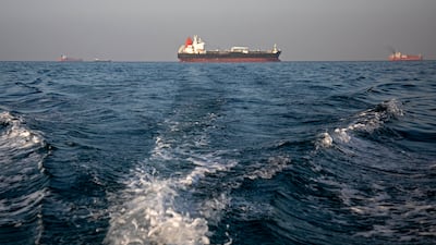 Ships wait near the Strait of Hormuz, where Iranian attacks have heavily disrupted commercial traffic. Getty Images