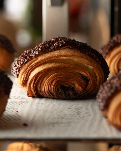 The Tanzanian milk chocolate pain au chocolat is the head chef's favourite. Photo: Franco Borromeo