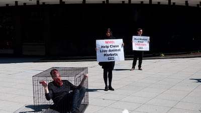 Members of PETA protest live markets outside the World Health Organization in Washington, DC. AFP