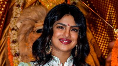 Bollywood actress Priyanka Chopra Jonas poses for photographs during 'Durja Puja' celebrations at the 72nd North Bombay Sarbojanin Durga Puja Samiti festival in Mumbai on October 6, 2019. / AFP / STR
