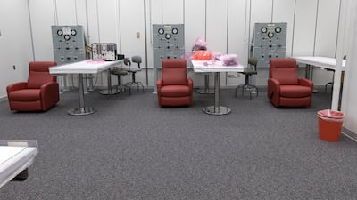 The room where astronauts are helped into their pressure suits before leaving crew quarters for a mission. All photos: Nasa