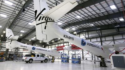 Virgin Galactic's WhiteKnightTwo carrier aircraft mothership, which landed safely after splitting from SpaceShipTwo, is seen in a hangar at Mojave Air and Space Port in Mojave, California. Lucy Nicholson / Reuters