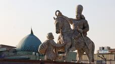 A general view of a sign of obedience a statue depicting Sasanian king Shapur I capturing Roman emperor Valerian, during its unveiling at Revolution Square in the capital Tehran, on November 11. AFP