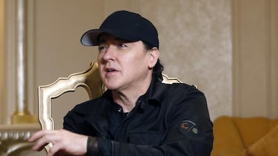 John Cusack talks to The National at Emirates Palace during his visit to the Capital to host a meal as part of the Abu Dhabi Food Festival. Ravindranath K / The National
