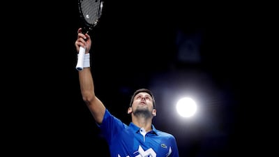 Novak Djokovic celebrates winning his group stage match. Reuters