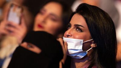 All audience members had to show proof of vaccination against Covid-19 upon entry, while wearing masks was optional.