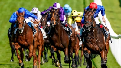 Adayar and Adam Kirby on their way to victory at Epsom. PA