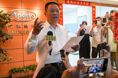 Hsu Ching-kuang, head of Taiwanese company Gold Apollo, outside the company's office in New Taipei City. AFP