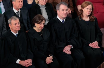 Supreme Court Chief Justice John Roberts, Associate Justice Elena Kagan, Associate Justice Brent Kavanaugh and Associate Justice Mary Coney Barrett attend the State of the Union address during a Joint Session of Congress at the US Capitol on February 24, 2026, in Washington. AFP