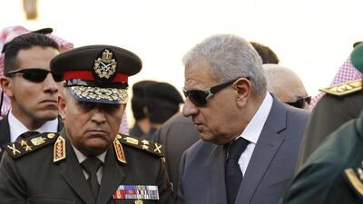 Egyptian prime minister Ibrahim Mahlab, right, and his country’s minister of defence Sedki Sobhi offer their condolences to Saudi Arabia on January 23, 2015. Ahmed Yosri/EPA