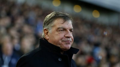 West Ham manager Sam Allardyce observes his side during their 2-1 loss to Arsenal in the Premier League on Sunday. Steve Bardens / Getty Images / December 28, 2014