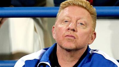 Former world No 1 tennis player from Germany, Boris Becker, watches during the semi-final match between Novak Djokovic and Jo-Wilfried Tsonga at the Mubadala World Tennis Championship in Abu Dhabi on Friday. Becker is the new head coach of Djokovic and makes his first appearance as such in Abu Dhabi. Ali Haider / EPA