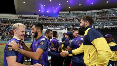 Bangla Tigers celebrate after beating Qalandars and sealing third place in the Abu Dhabi T10 at Zayed Cricket Stadium. Chris Whiteoak / The National