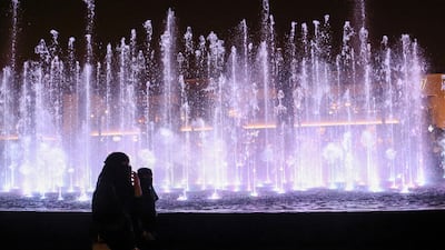 Women walk past fountain in Riyadh. The kingdom aims to increase the tourism sector’s contribution to its economy under the Vision 2030 programme. Reuters