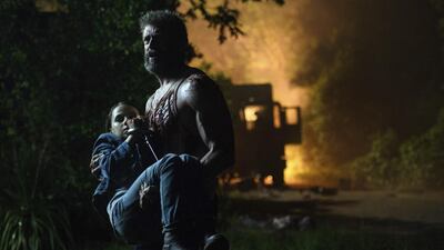 Dafne Keen, left, and Hugh Jackman in a scene from Logan. Ben Rothstein / Twentieth Century Fox via AP