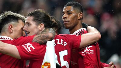 Manchester United's Marcus Rashford, right, celebrates scoring against Brentford at Old Trafford. PA