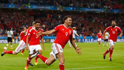 Hal Robson-Kanu, centre, of Wales celebrates scoring during their Euro 2016 quarter-final match victory over Belgium at Stade Pierre-Mauroy on July 1, 2016 in Lille, France. Clive Rose/Getty Images