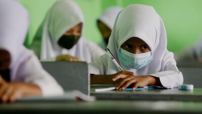 High school students study during a class session at Al Hidayah Muslim school in Depok, Indonesia. The Indonesian government began to reopen schools amid the coronavirus pandemic, especially in green zones in a number of regions. EPA