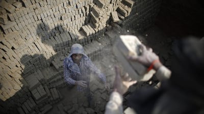 An Indian migrant worker at a brick factory in Lalitpur, Nepal. Navesh Chitrakar / Reuters