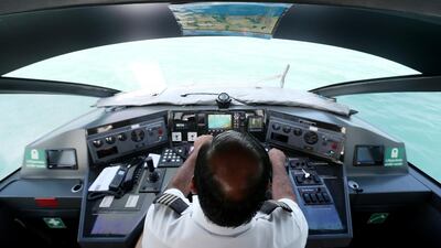 An RTA water taxi driver transports journalists to Sony’s Xperia Aquatech Store. Christopher Pike / The National