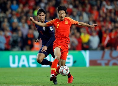 Wu Lei, right, topped the Chinese Super League scoring charts last season, but he is one of a few Chinese players among the goals. Hassan Ammar / AP Photo