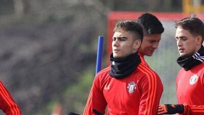 Manchester United's Belgian midfielder Andreas Pereira takes part in a team training session at their Carrington Training Centre in Manchester, north west England on February 24, 2016. The gloom that has been descending on Manchester United lifted a little when they beat Shrewsbury in the FA Cup on Monday, but manager Louis van Gaal remains a man facing problems. United's manager has no margin for error as he attempts to maintain his team's chances of a European trophy when they face Midtjylland at Old Trafford on Thursday. / AFP / LINDSEY PARNABY