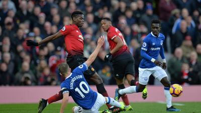 Everton's Gylfi Sigurdsson in action with Pogba. Reuters