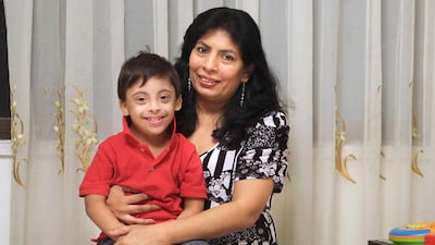 Chandani Desilva with her five-year-old son Joshua, who has Down syndrome. Ms Desilva is pushing for better care for special needs children back in her native Sri Lanka. Delores Johnson / The National
