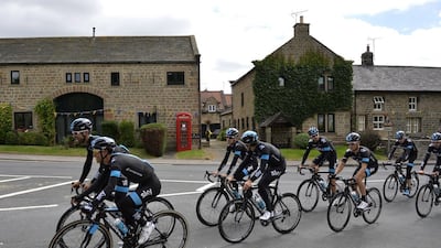 Riders of Britain's Sky cycling team take part in a training session on July 4, 2014, in Leeds, northwestern England, before the start of the 101st edition of the Tour de France. Jeff Pachoud / AFP