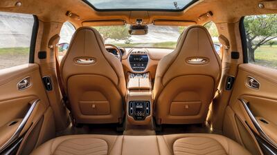 Aston goes beyond the usual leather, timber and polished alloy look inside