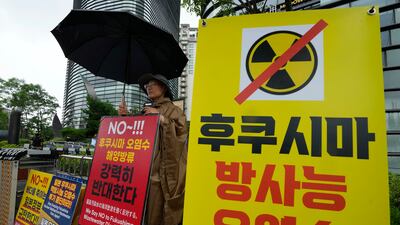 A Buddhist monk in Seoul protests against Japan's plan to release radioactive water from the Fukushima plant into the sea. AP