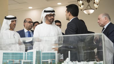 Sheikh Mohammed bin Zayed, Crown Prince of Abu Dhabi and Deputy Supreme Commander of the Armed Forces, at Burjeel Hospital with Dr Shamsheer Vayalil, managing director of VPS Healthcare, who gave him an update on Burjeel Medical City. The Dh1.2bn hospital will open in the city next year. With them is Dr Mugheer Al Khaili, Chairman of the Health Authority Abu Dhabi. Hamad Al Kaabi / Crown Prince Court – Abu Dhabi