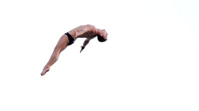 Abu Dhabi, United Arab Emirates - November 10, 2018: Nikitita Fedotov of Russia competes in the final of the mens section at the Fina High Board Diving World Cup. Saturday, Novemeber 10th, 2018 at the Abu Dhabi Yacht and Sailing Club, Abu Dhabi. Chris Whiteoak / The National