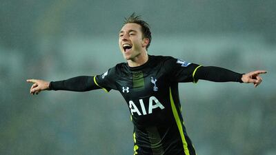 Tottenham's Christian Eriksen celebrates after scoring the winner on Sunday against Swansea City for a 2-1 Premier League victory. Stu Forster / Getty Images / December 14, 2014