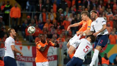 Netherlands' de Ligt, second right, scores the 1-1 equaliser. AP Photo