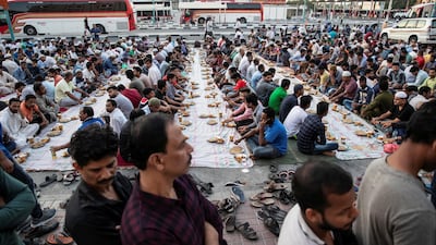 Iftar meals distributed at the New Fatima Mosque adjacent to the Al Ghubaiba Bus Station in Bur Dubai. Antonie Robertson / The National