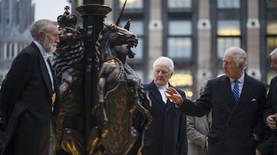 King Charles III (right) in the Houses of Parliament to unveil a plaque marking the place of the lying-in-state of the late Queen Elizabeth II. PA