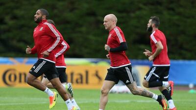Wales’ Ashley Williams, left, and David Cotterill run on the pitch during a training session in Dinard, western France, Tuesday, July 5, 2016. Wales will face Portugal in a Euro 2016 semi-final match at the Grand Stade in Decines-Charpieu, near Lyon, France, Wednesday, July 6, 2016. David Vincent / AP Photo