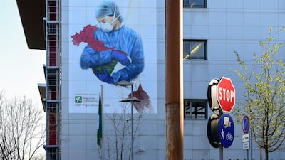 A mural painted on a wall of the Papa Giovanni XXIII Hospital in the city of Bergamo in Lombardy, the ground zero of Italy's oubtreak. AFP